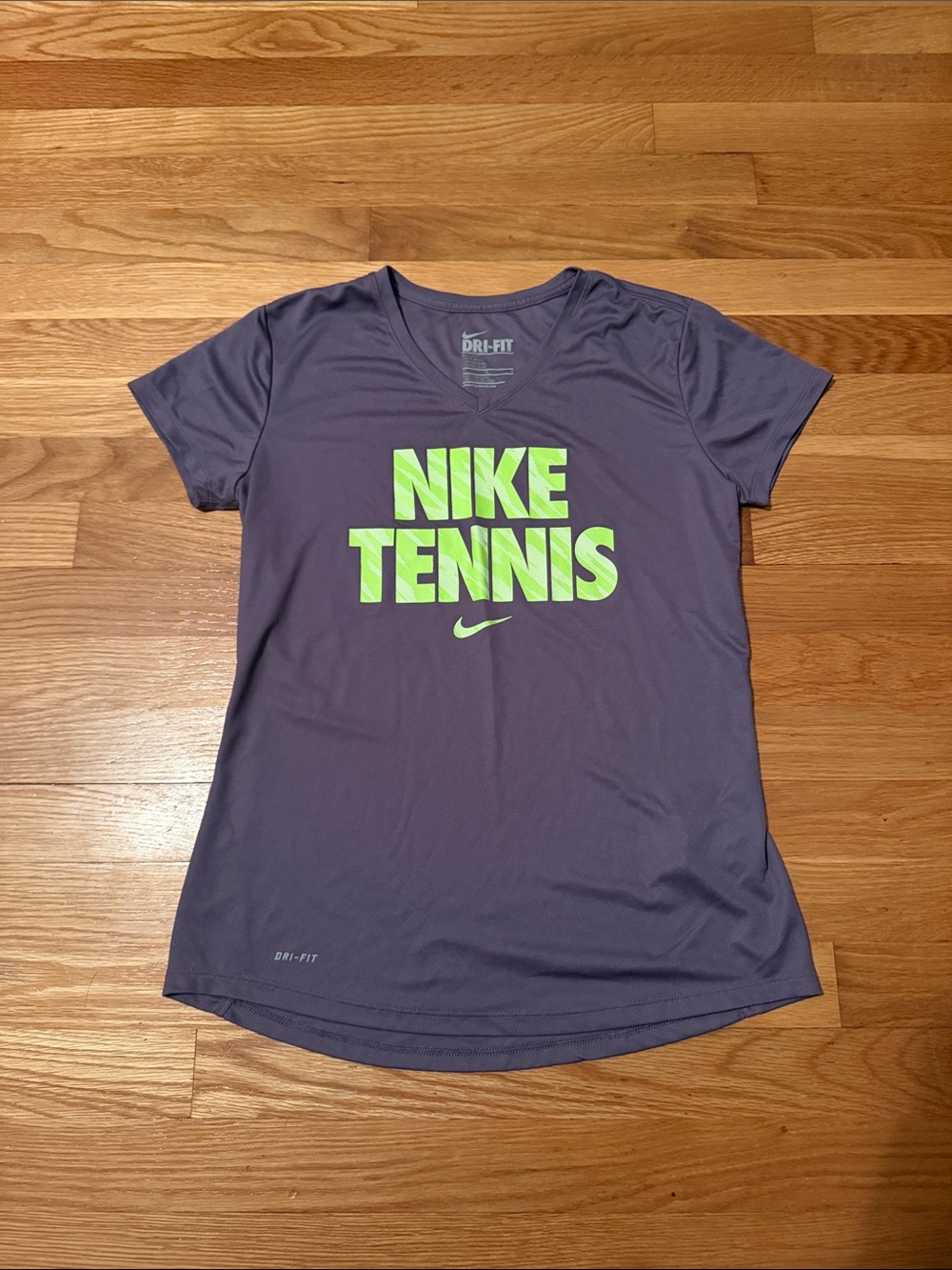 Nike Women’s Purple Short Sleeve Tennis Tee with Neon Green Logo